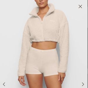 SKIMS TEDDY ZIP UP CROP JACKET IN COLOR BONE - size small